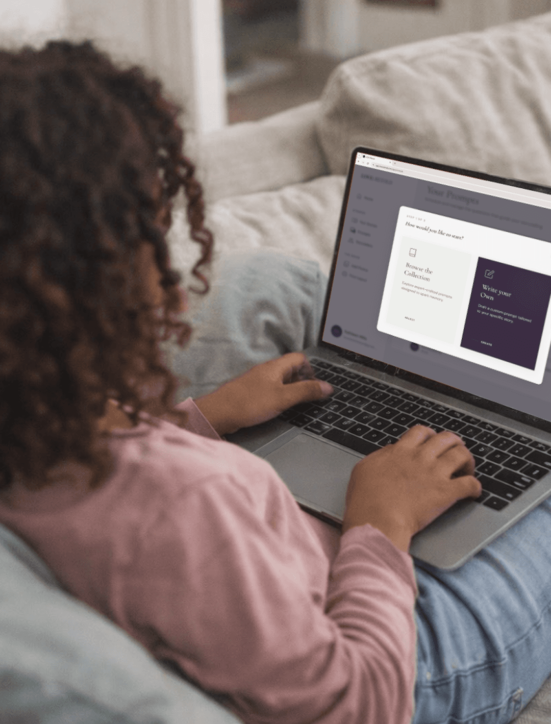 Woman using laptop to browse Love Retold prompts and story collection interface